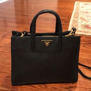 Prada saffiano top handle bag.